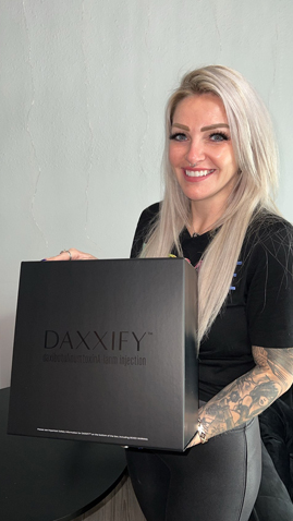 marlee-bruno-holding-daxxify-box Marlee Bruno holding Daxxify box
