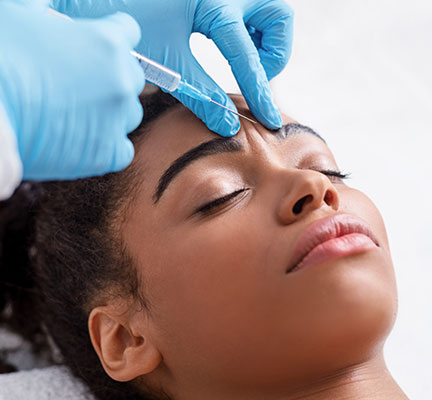 woman-neurotoxin-injections-in-pensacola-fl Mind Body & Soul Medical DAXXIFY® & XEOMIN®