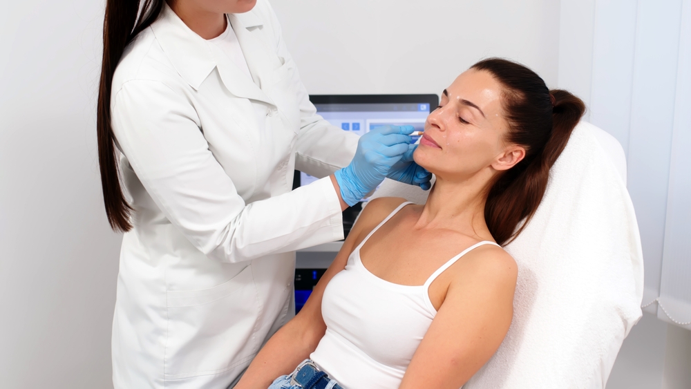 woman getting lip filler in Pensacola FL